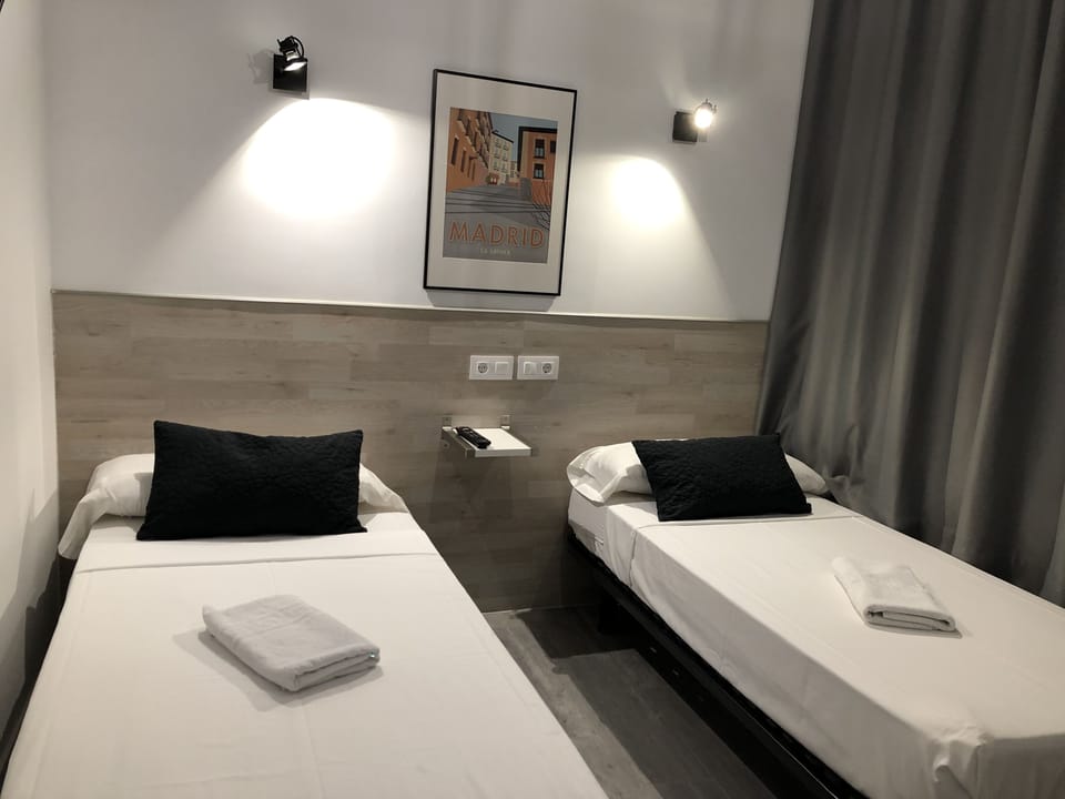 Twin Room | Desk, blackout drapes, free WiFi, bed sheets