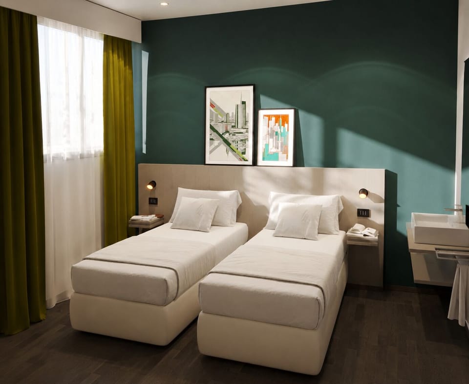 Twin Room, 2 Twin Beds | In-room safe, desk, laptop workspace, blackout drapes