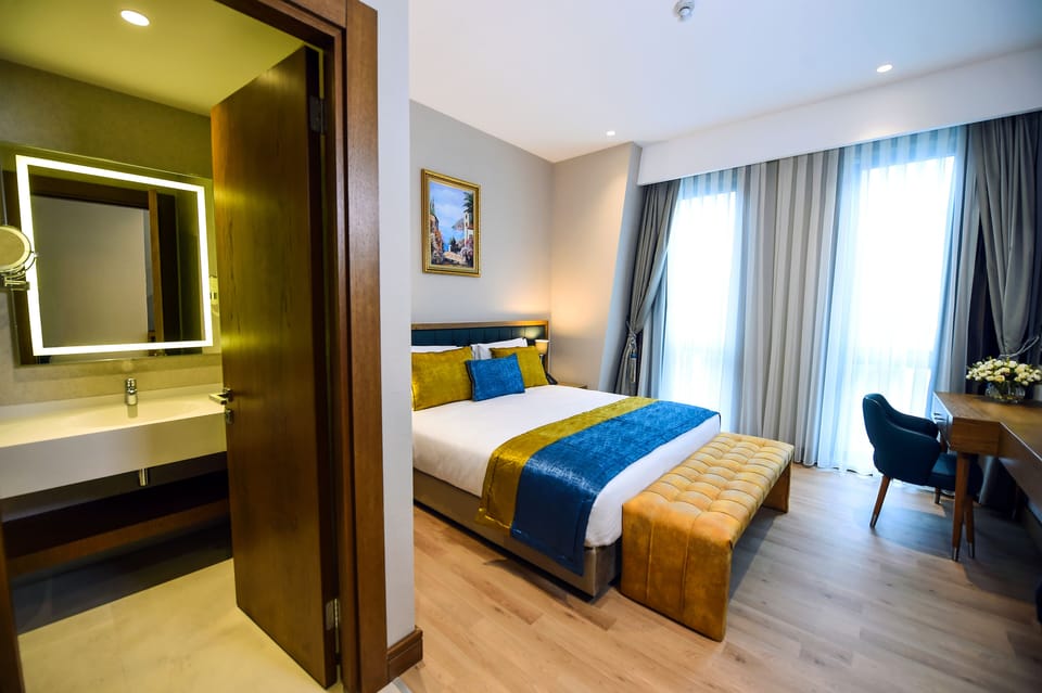Premium bedding, pillowtop beds, minibar, in-room safe