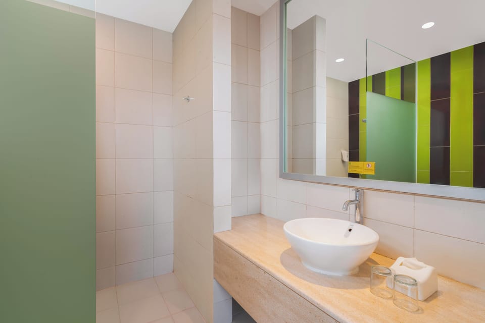 Shower, eco-friendly toiletries, hair dryer, slippers
