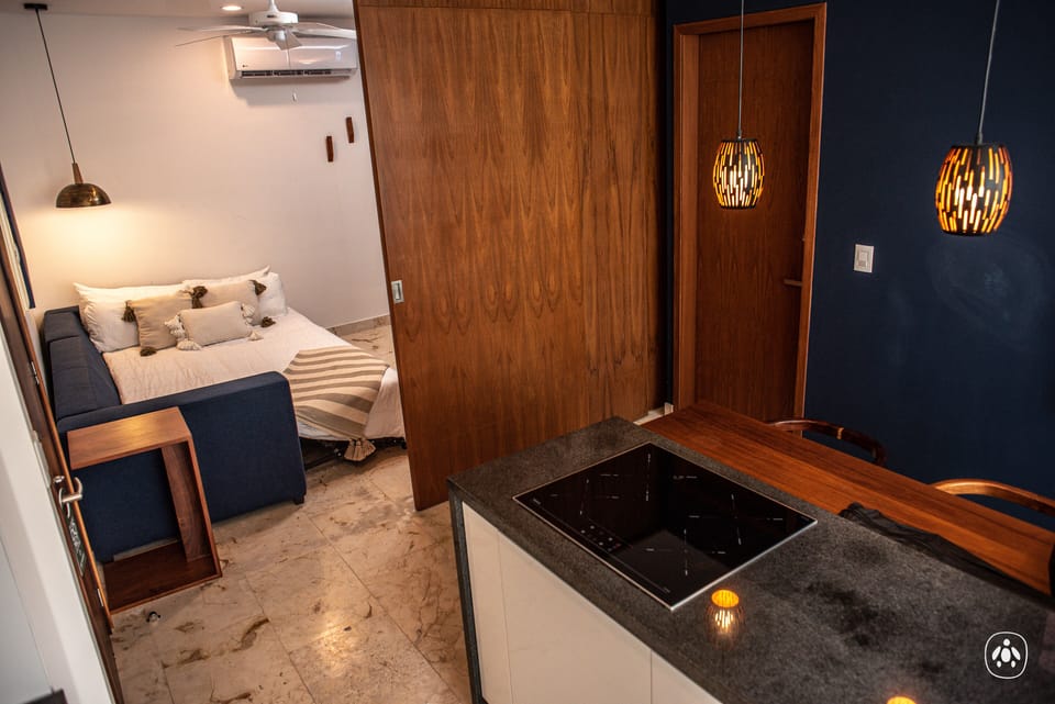 Comfort Studio Suite | Living area | 50-inch Smart TV with cable channels, TV