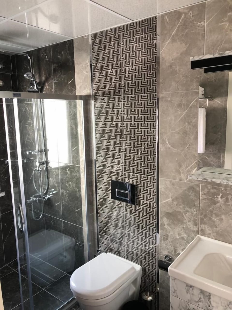 Shower, free toiletries, hair dryer, slippers