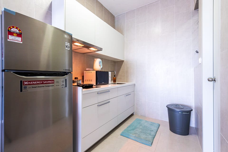 Family Apartment | Private kitchen | Fridge, microwave, electric kettle, cookware/dishes/utensils
