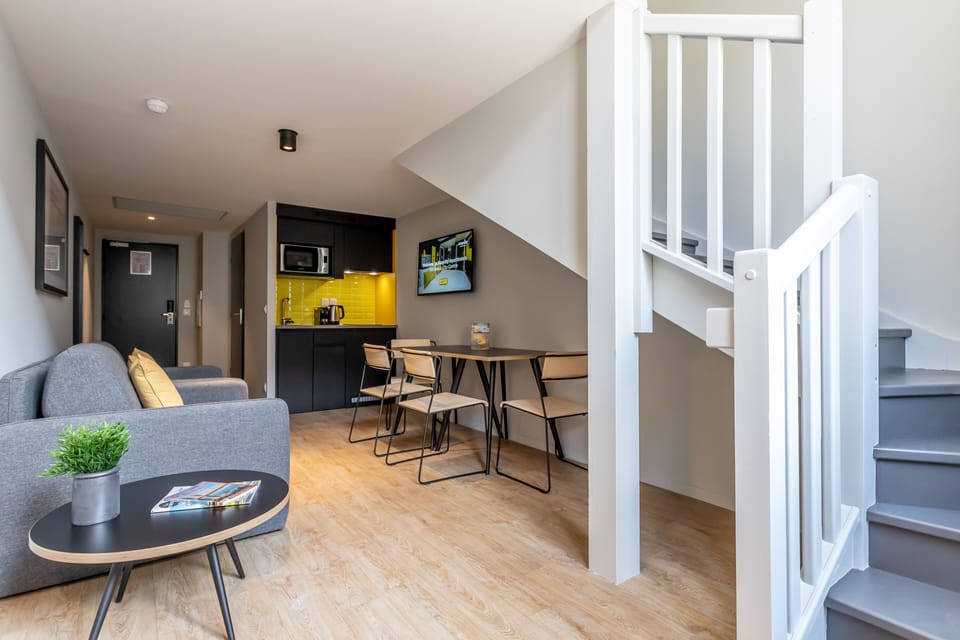 Studio Apartment Sleeps 4 | Living area | Flat-screen TV