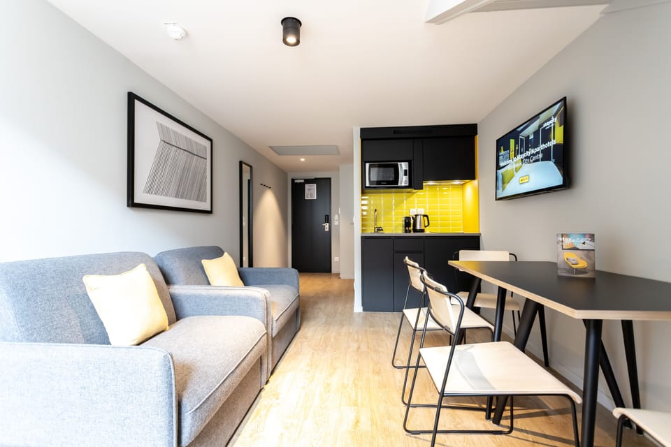 Studio Apartment Sleeps 4 | Living area | Flat-screen TV