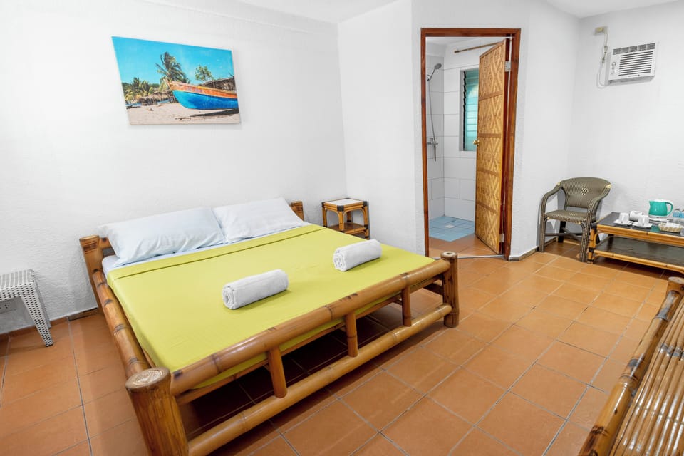 Double Room (with Air Conditioner) | In-room safe, bed sheets