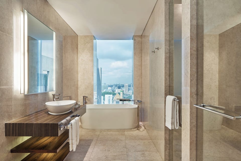Junior Suite, 2 Double Beds | Bathroom | Separate tub and shower, rainfall showerhead, free toiletries