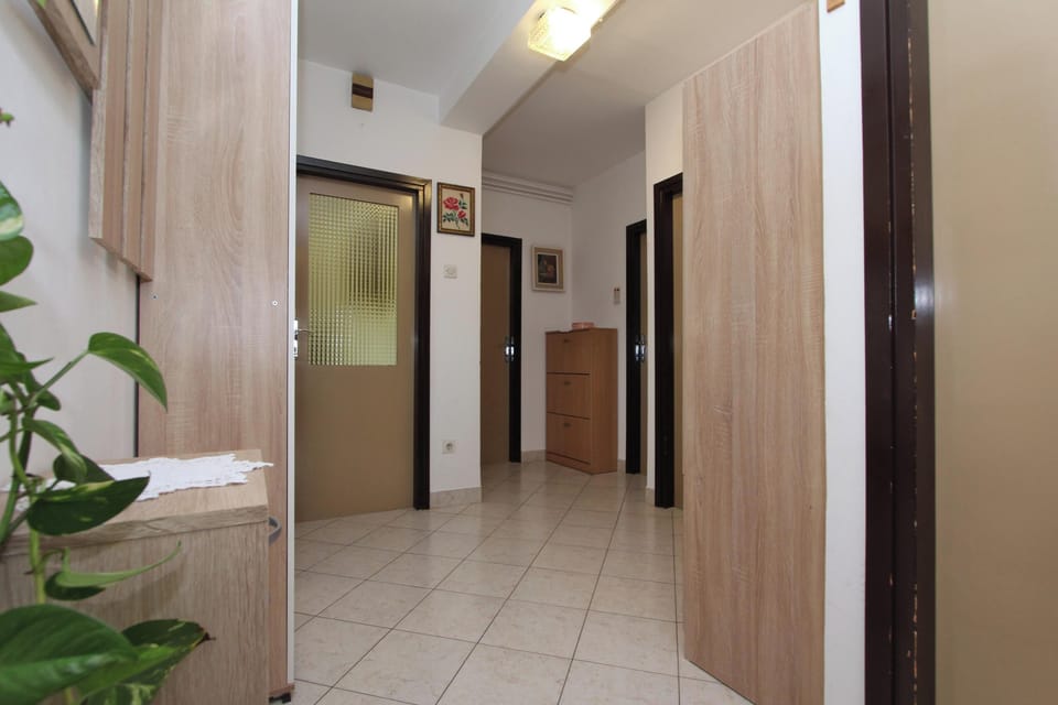 Apartment, 3 Bedrooms, Balcony | Living area | Flat-screen TV
