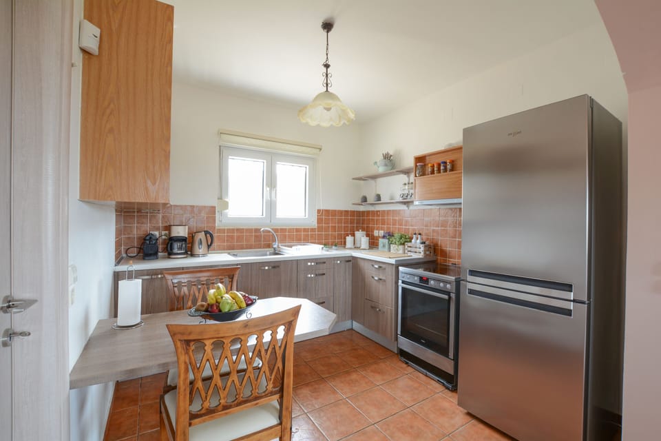 Deluxe Villa | Private kitchen | Stovetop, coffee/tea maker, electric kettle