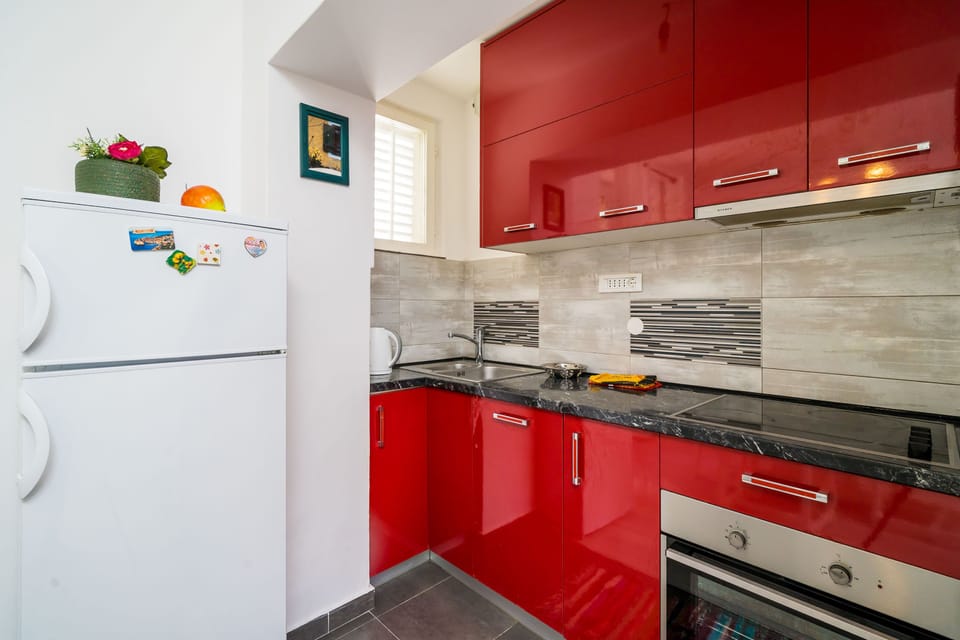 Apartment (Two Bedroom Apartment) | Private kitchen | Fridge, stovetop, dishwasher, electric kettle