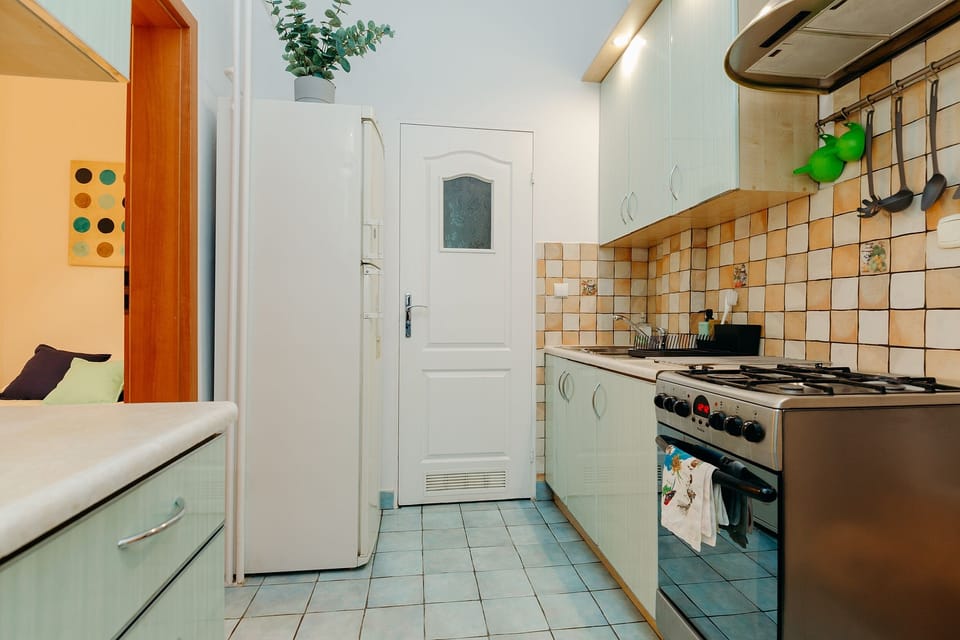 Comfort Apartment | Private kitchen | Full-size fridge, microwave, oven, stovetop