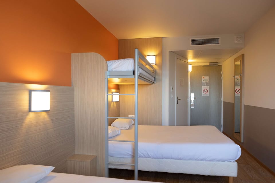 Desk, laptop workspace, blackout drapes, soundproofing