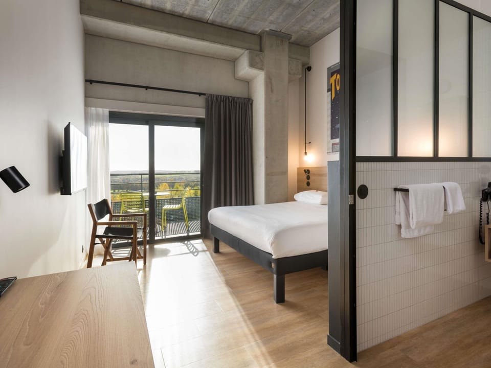 Comfort Room, 1 Double Bed, Balcony | In-room safe, desk, soundproofing, iron/ironing board