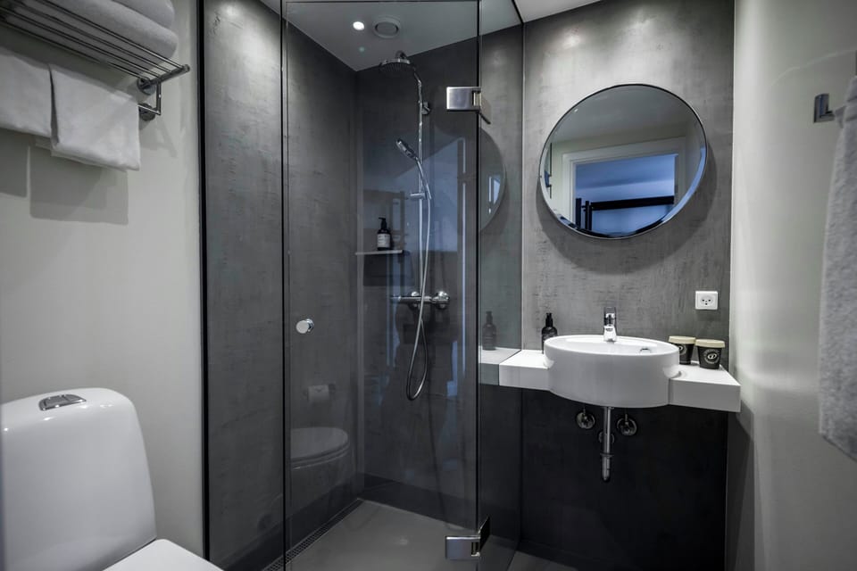Shower, rainfall showerhead, eco-friendly toiletries, hair dryer