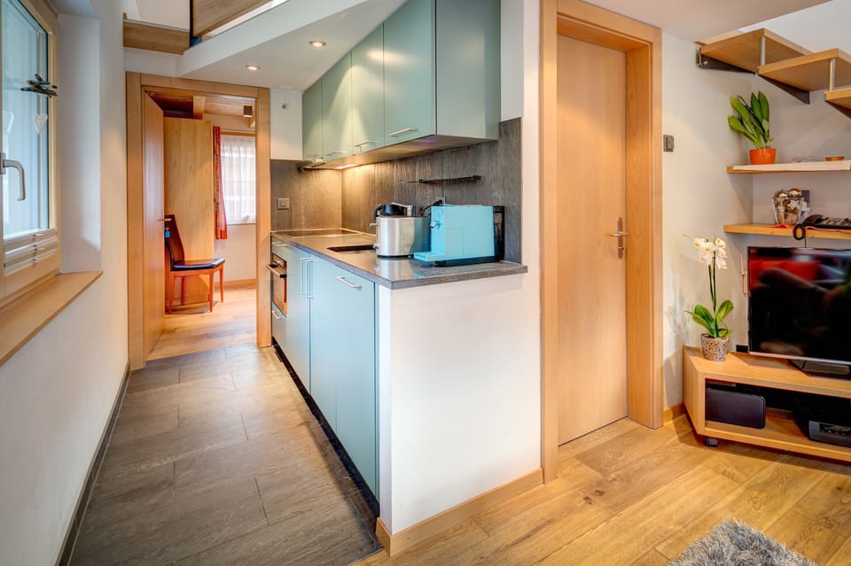 Luxury Chalet, 2 Bedrooms, Mountain View | Private kitchen | Full-size fridge, microwave, oven, stovetop