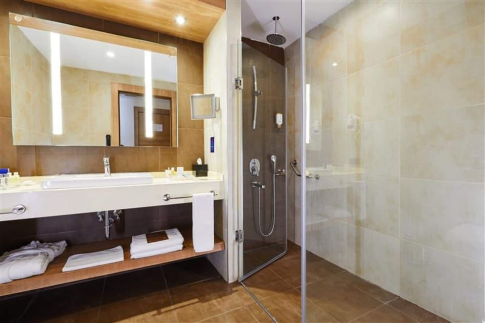 Shower, free toiletries, hair dryer, slippers