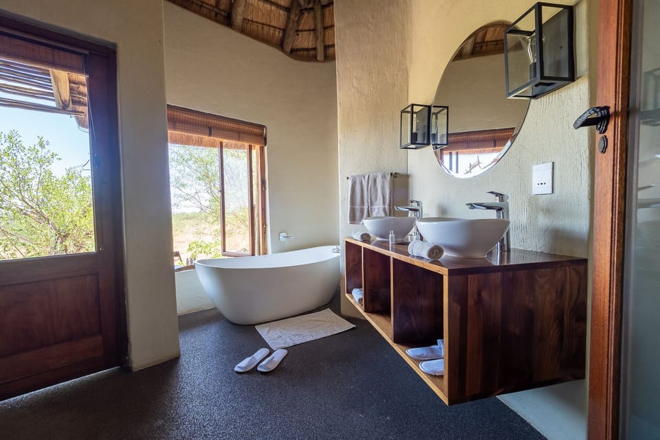 Separate tub and shower, deep soaking tub, free toiletries, hair dryer
