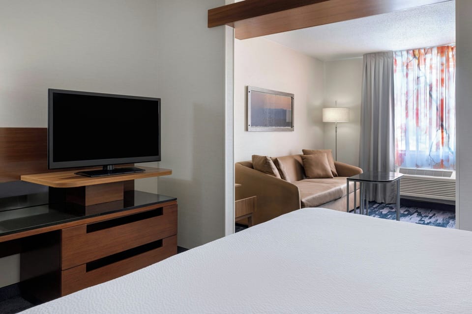 Hypo-allergenic bedding available, in-room safe, desk, laptop workspace