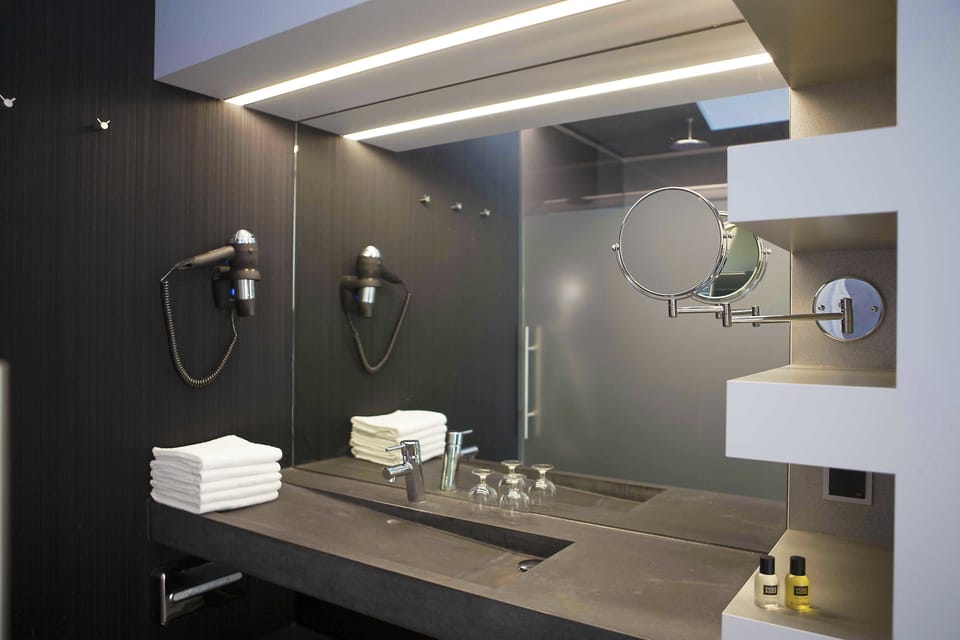 Shower, rainfall showerhead, eco-friendly toiletries, hair dryer