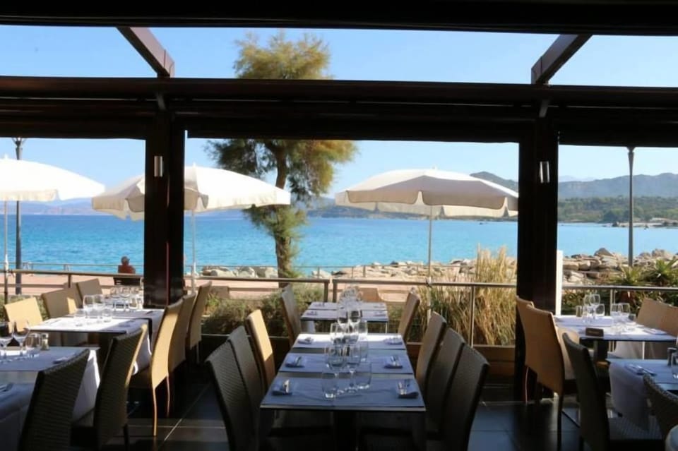 Lunch, dinner served; Mediterranean cuisine, pool views 