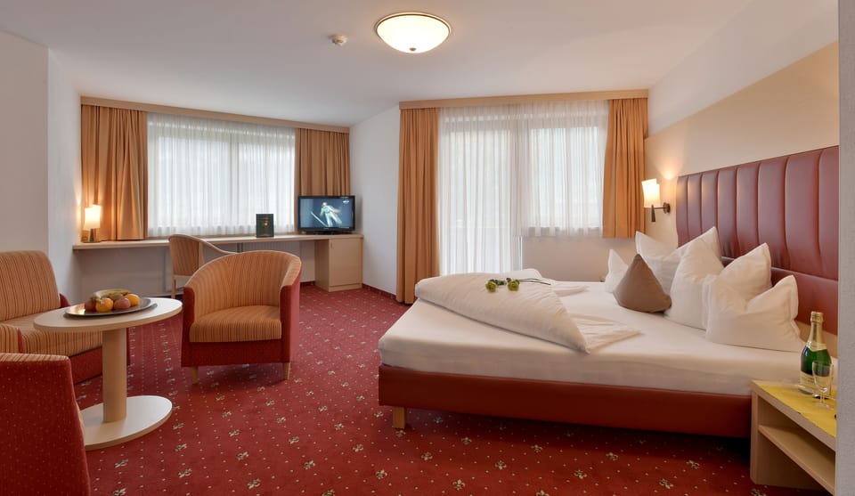 Premium bedding, down comforters, in-room safe, desk