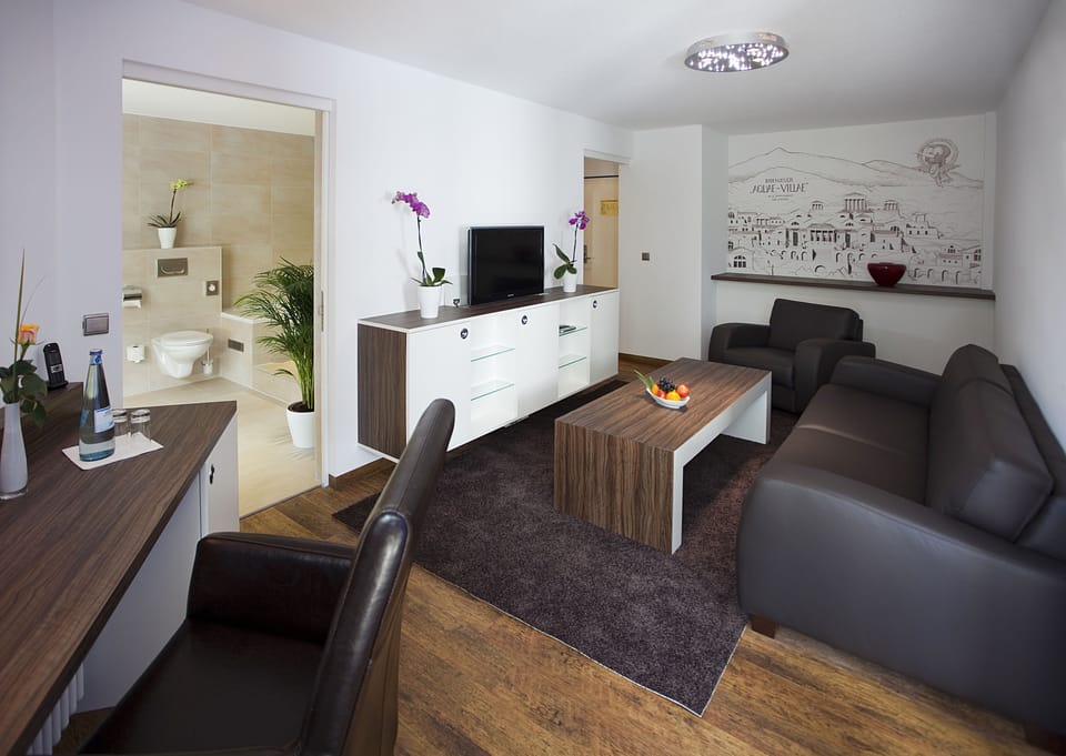 Royal Suite, 1 Bedroom | Living area | Flat-screen TV