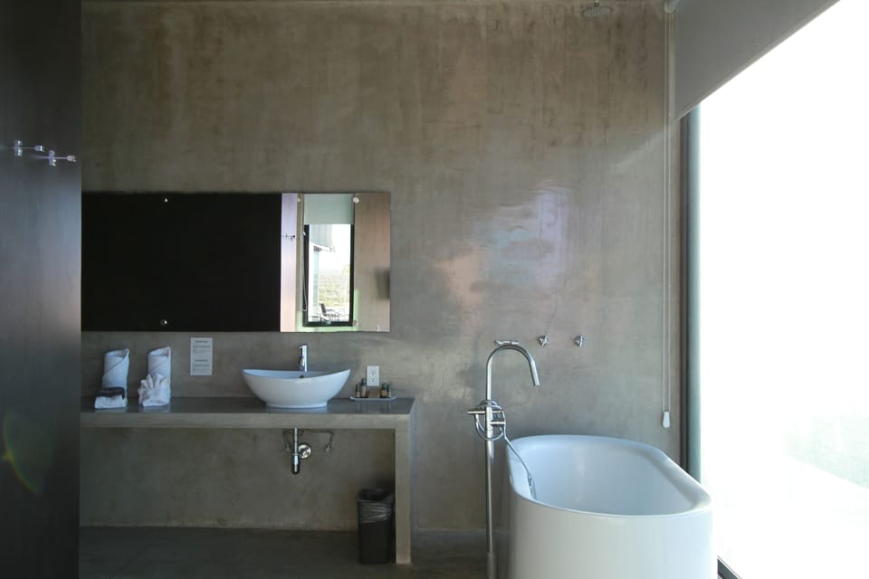 Honeymoon Studio Suite, Sea View | Bathroom | Designer toiletries, hair dryer, towels, soap