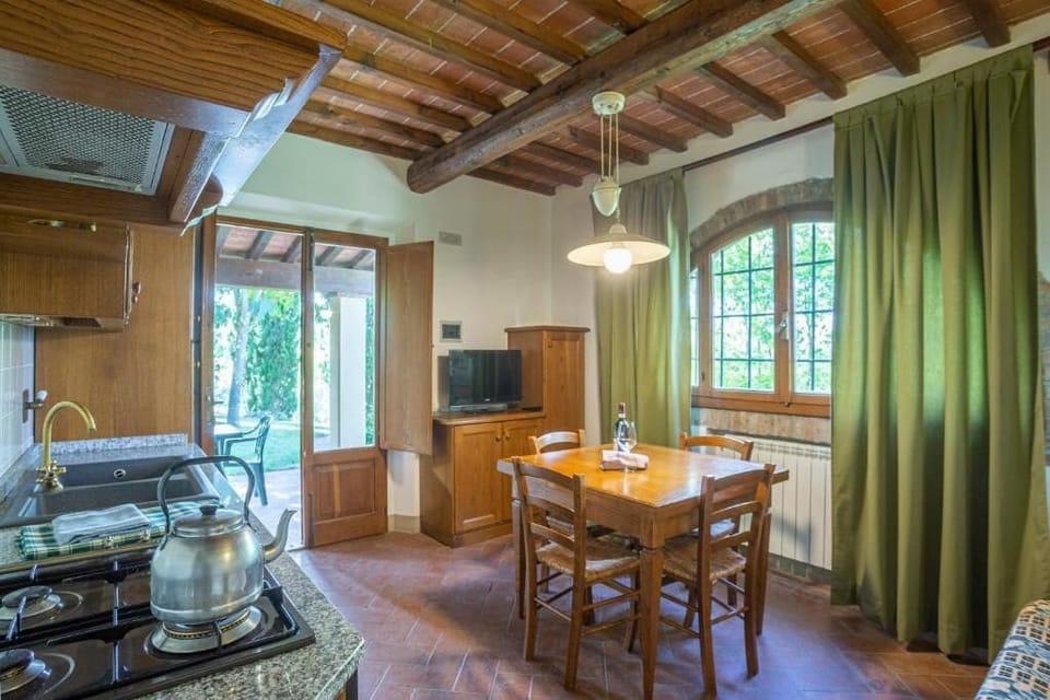 Apartment, 1 Bedroom | Living area | 90-cm flat-screen TV with cable channels, TV, table tennis