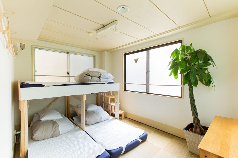 Economy Triple Room | Down comforters, desk, iron/ironing board, free WiFi