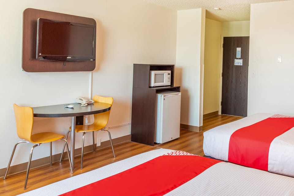 Premium Room, 2 Queen Beds | Desk, iron/ironing board, free rollaway beds, free WiFi