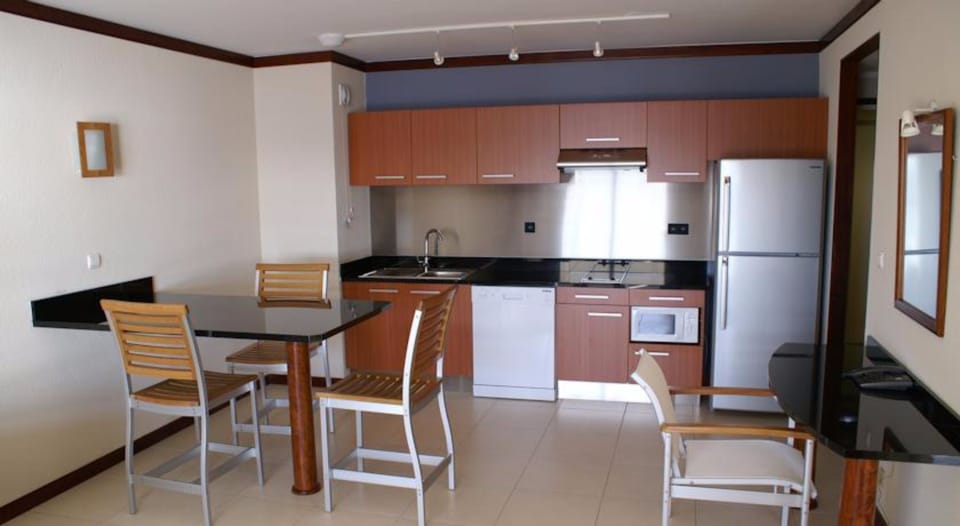 Suite, 1 Bedroom, Sea View | Living area | Flat-screen TV