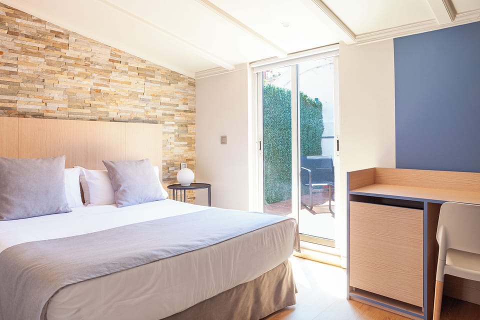 Double or Twin Room, Terrace | Minibar, in-room safe, desk, laptop workspace