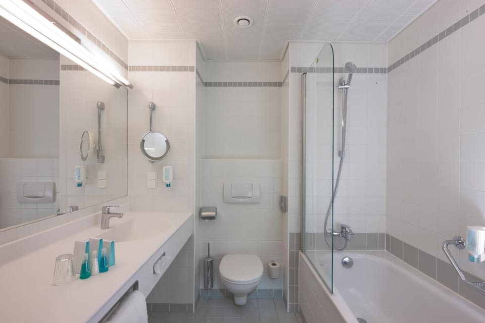 Eco-friendly toiletries, hair dryer, towels
