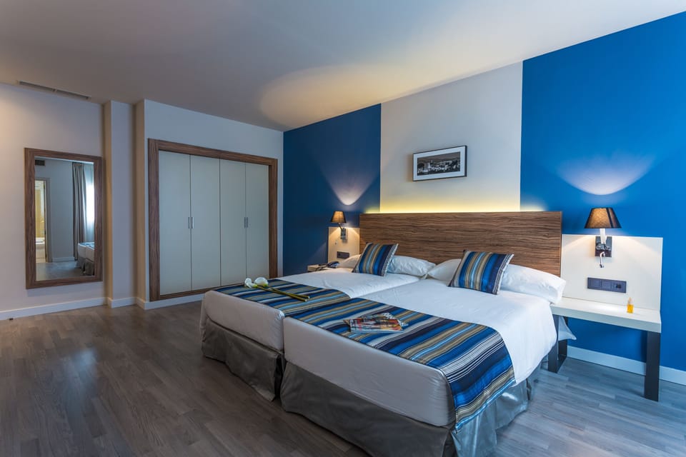 In-room safe, blackout drapes, soundproofing, free cribs/infant beds