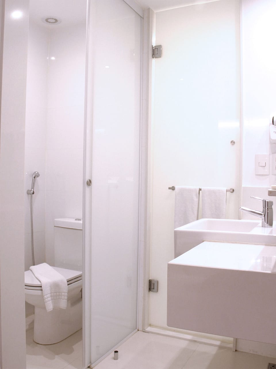 Shower, eco-friendly toiletries, hair dryer, towels