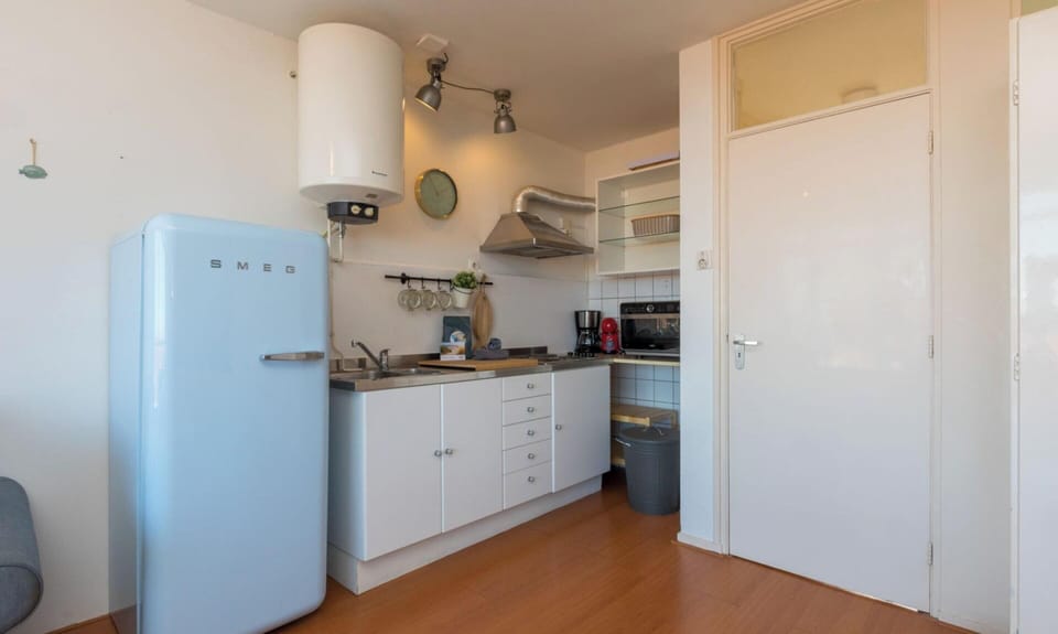 Apartment | Private kitchen | Oven, electric kettle, highchair