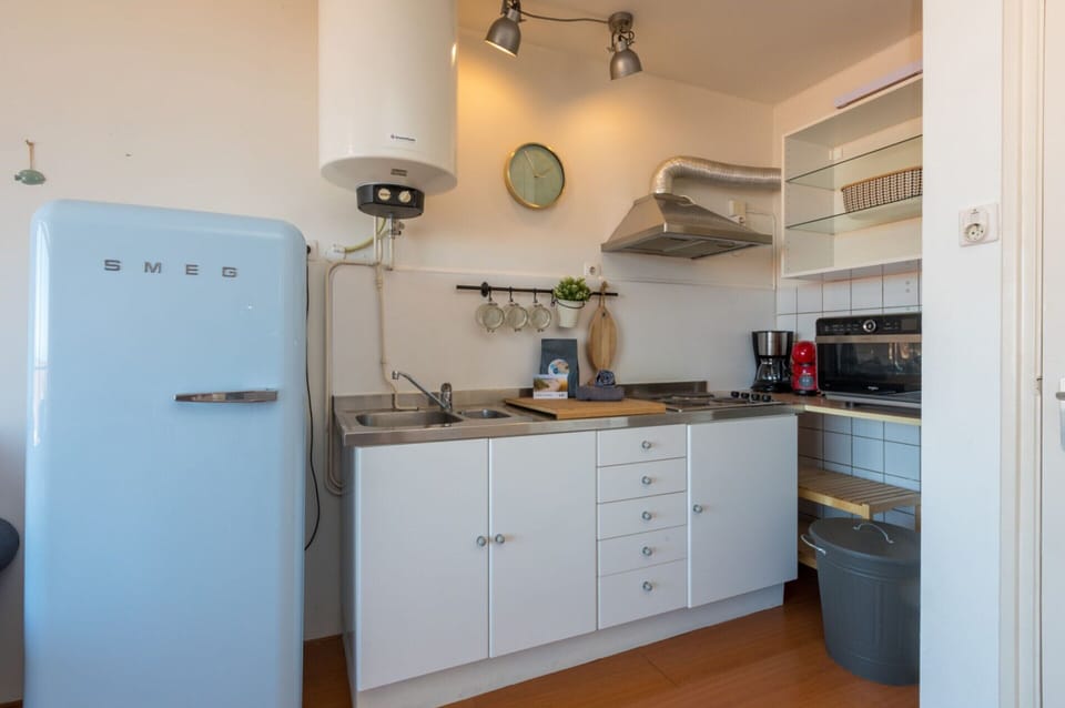 Apartment | Private kitchen | Oven, electric kettle, highchair
