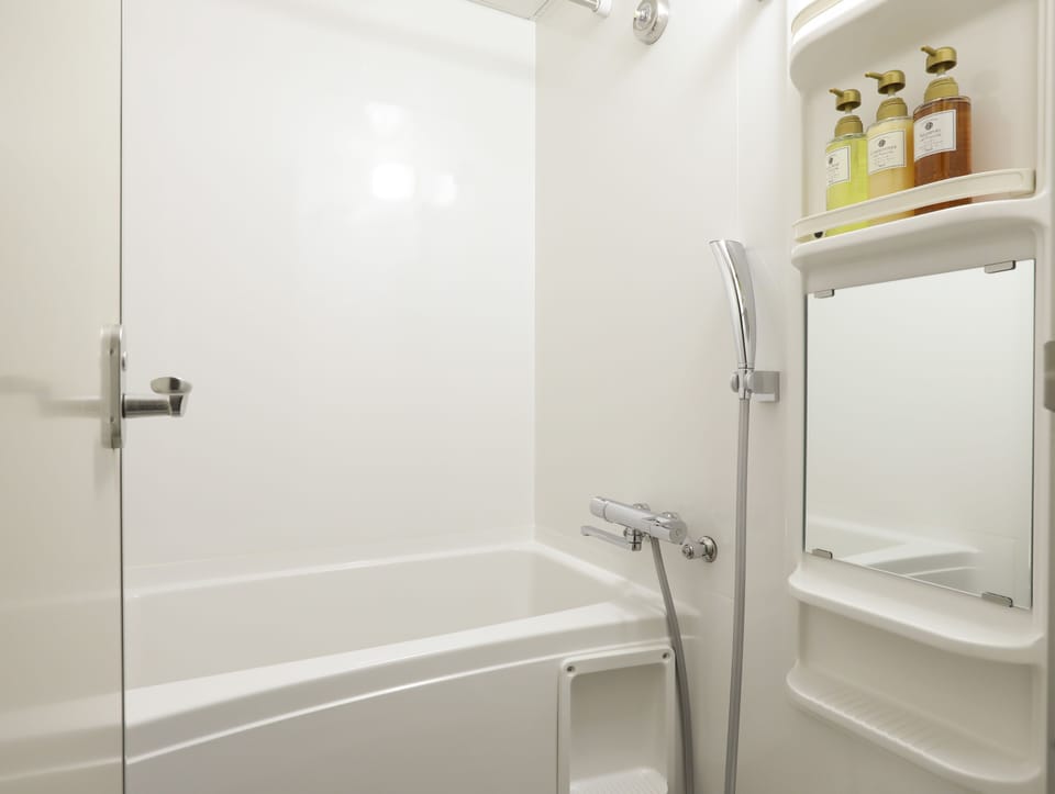 Combined shower/tub, free toiletries, hair dryer, bathrobes