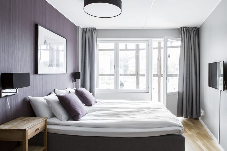 Double Room, Shared Bathroom (Hotel) | Blackout drapes, soundproofing, iron/ironing board, cribs/infant beds
