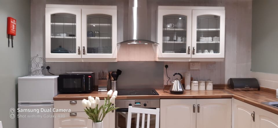 Comfort House, Private Bathroom | Private kitchen | Highchair