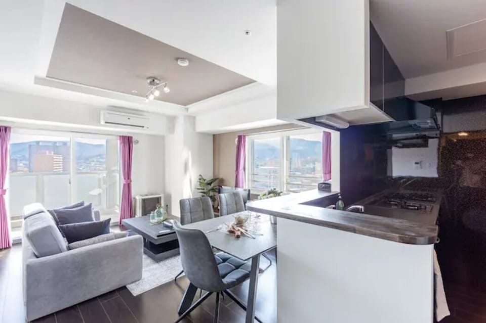 Apartment, Non Smoking | Living area | Flat-screen TV