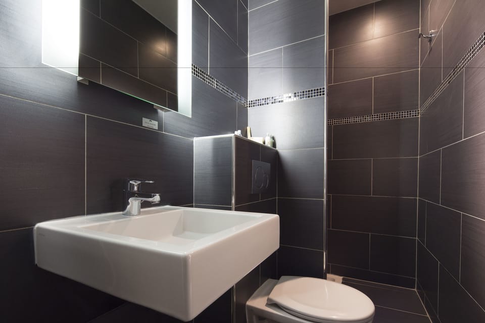 Eco-friendly toiletries, hair dryer, bathrobes, towels