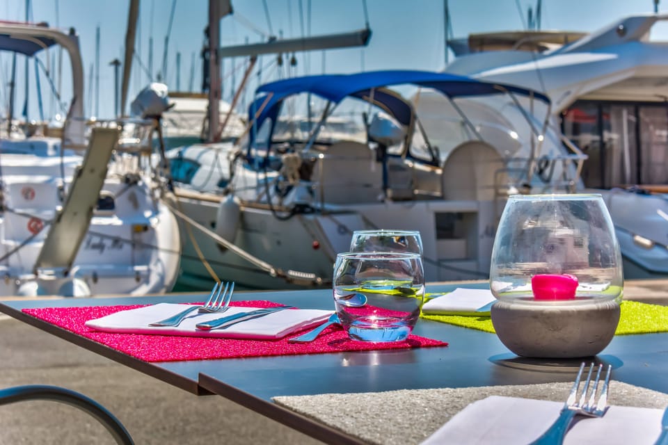 Lunch, dinner served; Mediterranean cuisine, beach views 