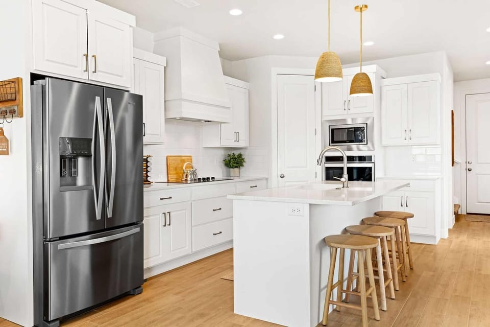 Townhome, 5 Bedrooms | Private kitchen | Fridge, oven, coffee/tea maker, toaster
