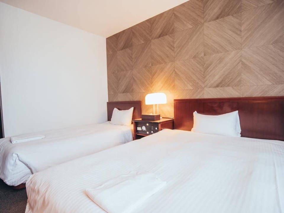 Twin Room, Non Smoking | Down comforters, WiFi (free)