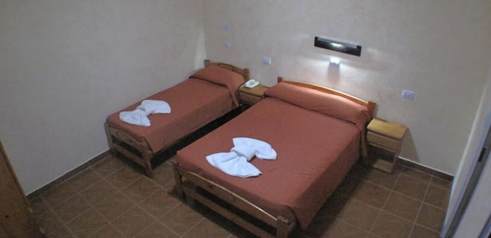 Triple Room | Pillowtop beds, free WiFi, bed sheets
