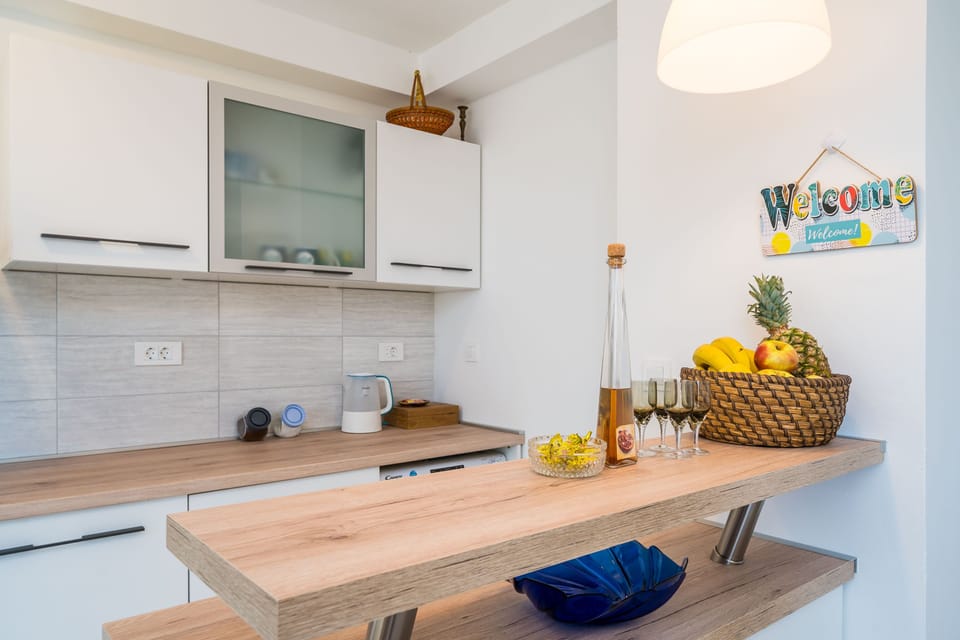 Apartment (Two Bedroom Apartment with Terrace) | Private kitchen | Fridge, stovetop, dishwasher, electric kettle
