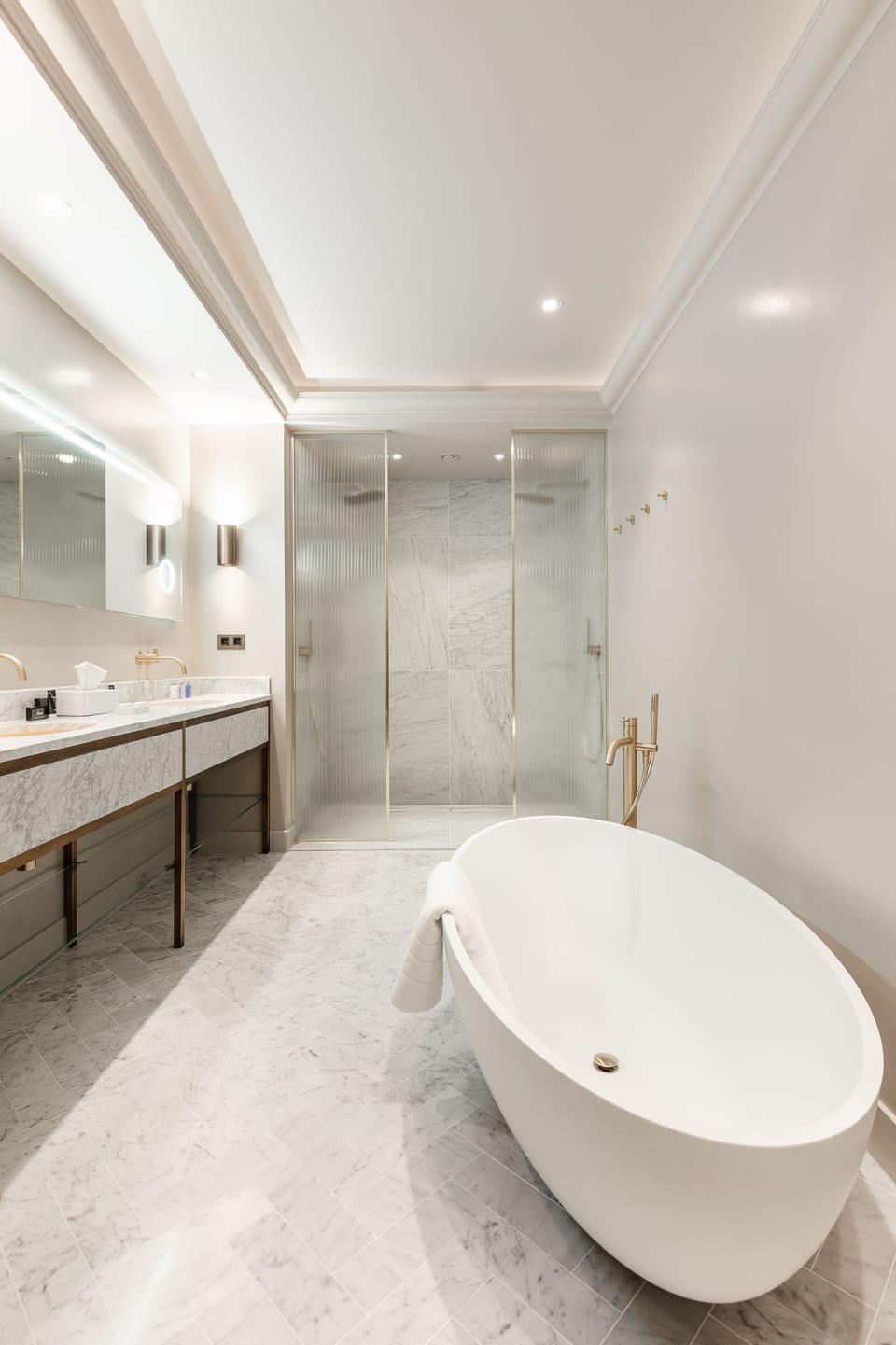 Designer toiletries, hair dryer, bathrobes, towels