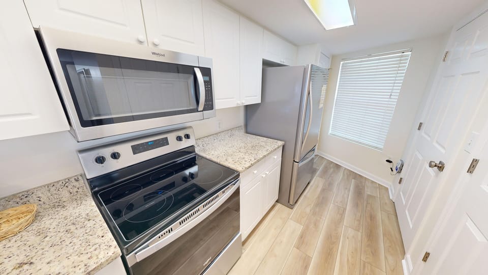 Condo, 2 Bedrooms | Private kitchen | Fridge, microwave, coffee/tea maker, toaster