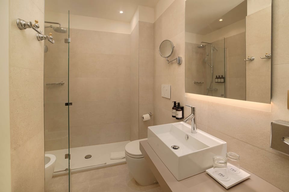 Superior Room (View) | Bathroom | Shower, designer toiletries, hair dryer, towels